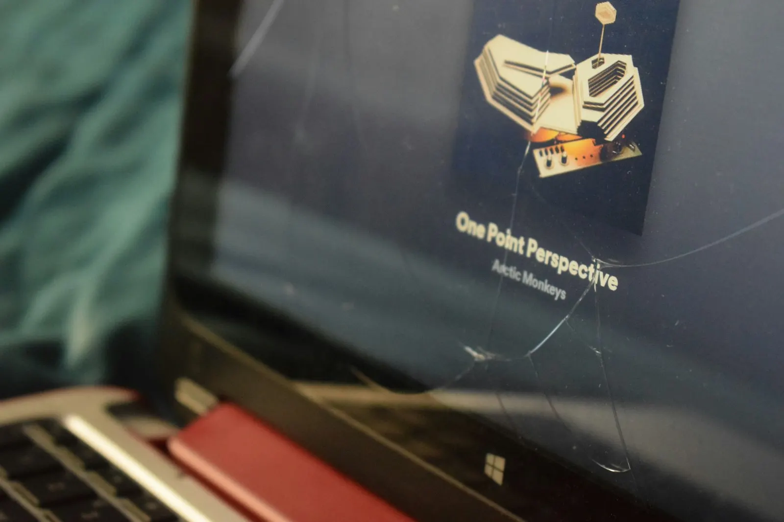 Close up of a crack running across a laptop display