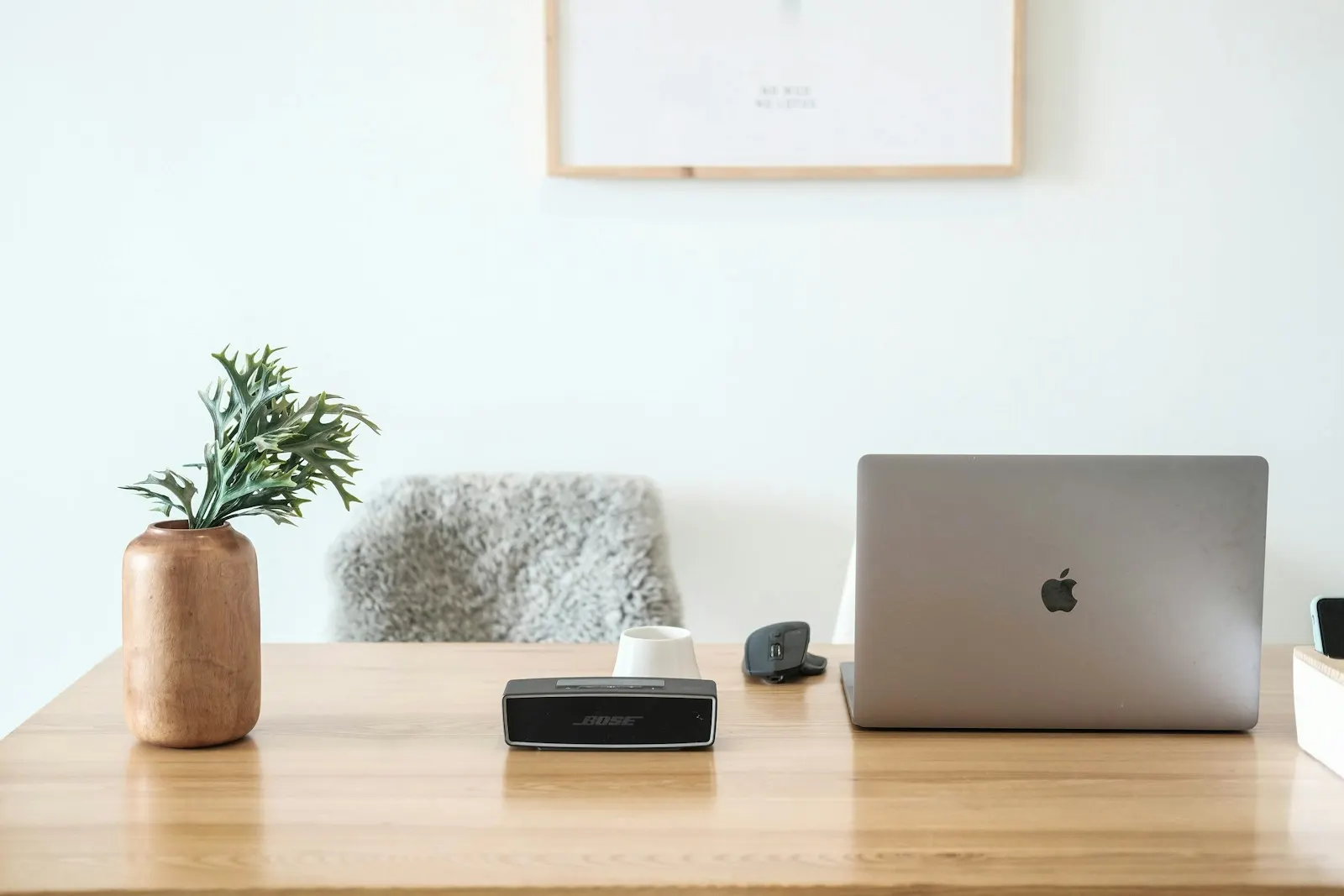 A MacBook on a home office desk