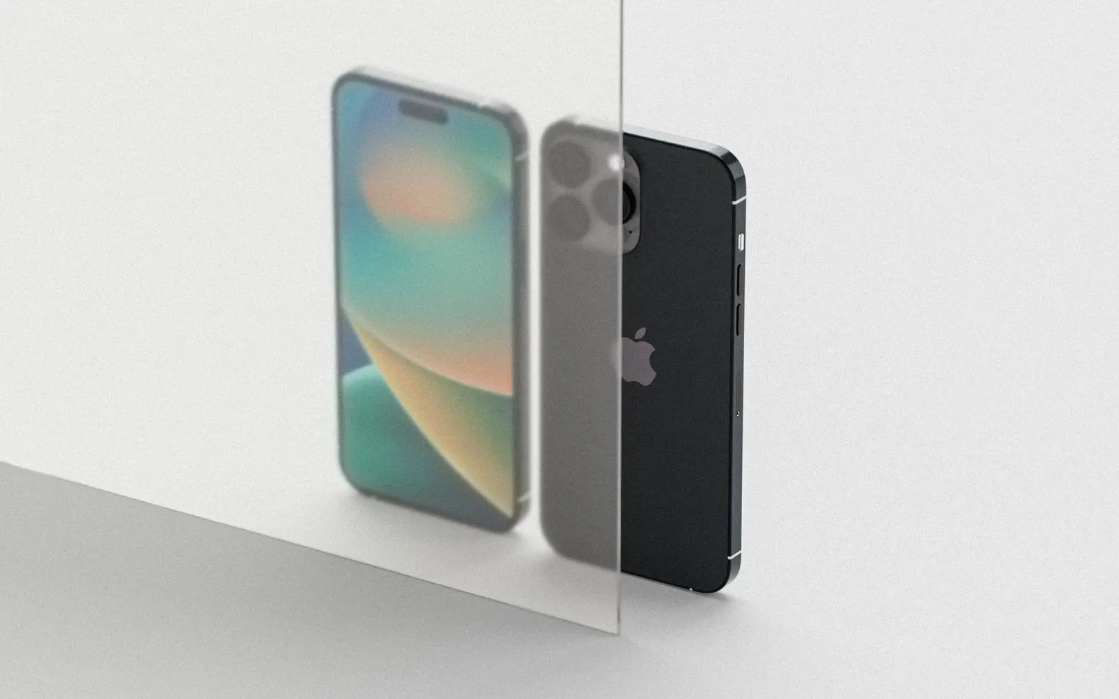 Two iPhone Pro models standing on a white surface, one seen through a clear glass panel