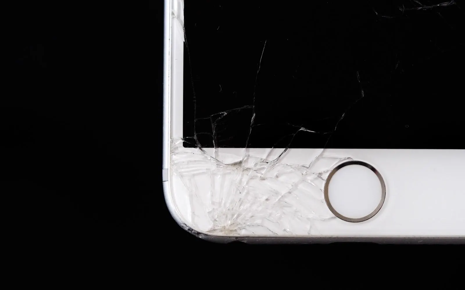 A close-up of shattered smartphone glass